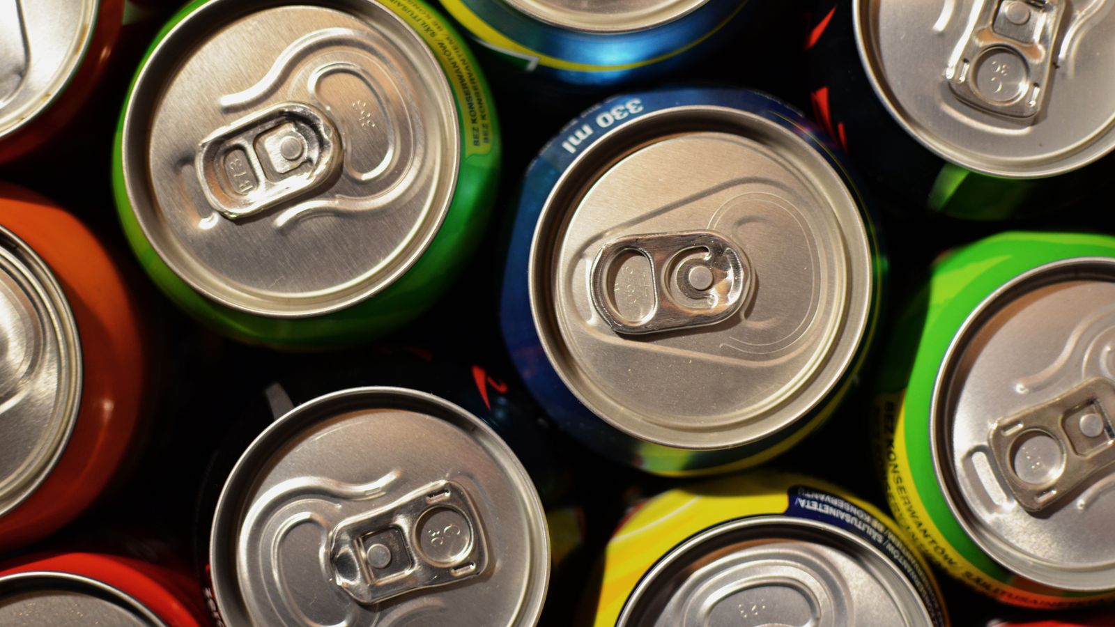 Assorted soft drink cans