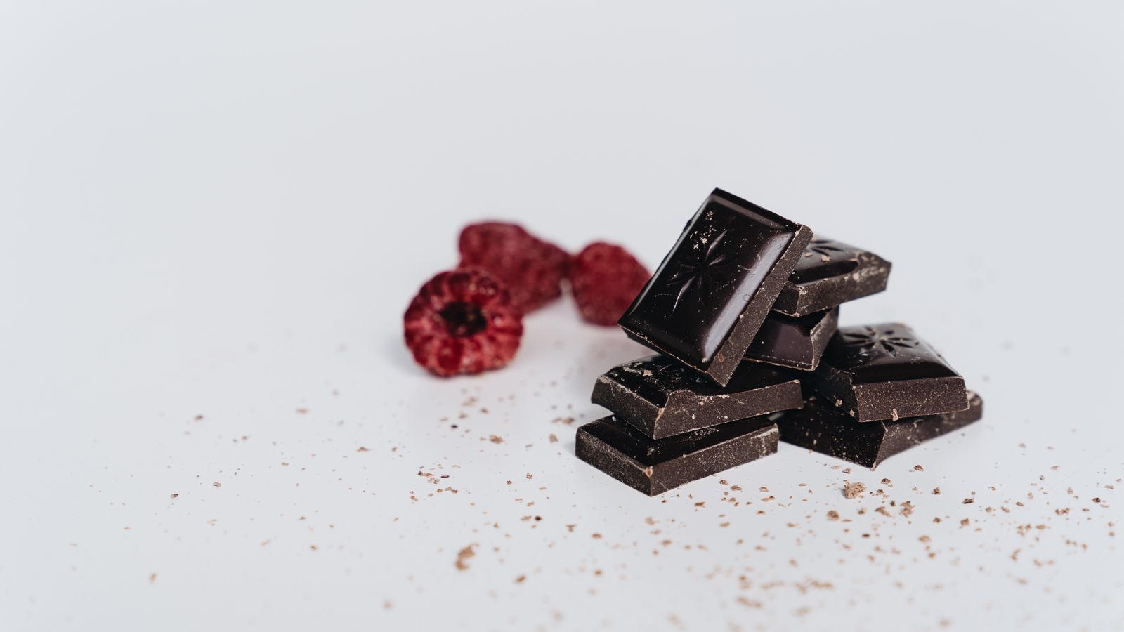 Chocolate pieces and raspberries